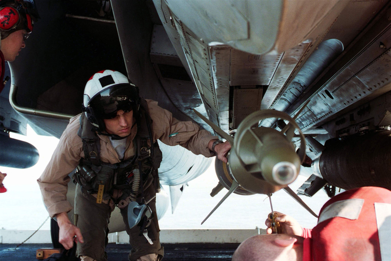 Checking the bombs on the F-14 BombCat